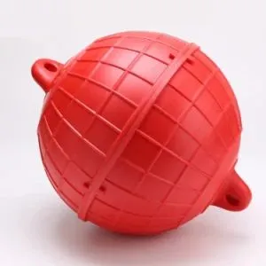This rigid plastic pearl farm float, about 8 to 12 inches in diameter, provides just enough buoyancy to lift the chain clear of coral heads and snags without overdoing it.